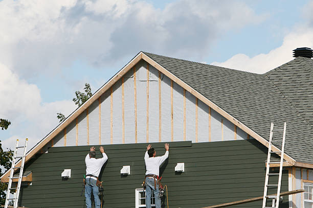Professional Siding Contractor technician working in Hines, OR